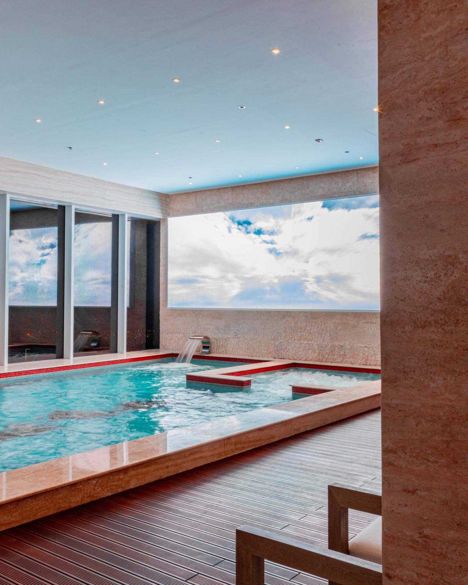 The Bentley Luxury Hotel & Suites Doha Bagian luar foto The spa at The Ritz-Carlton, Tysons
